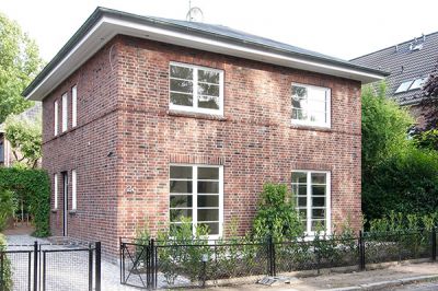 Umbau Architekt: Fassade Wohnhaus: neue Sprossenfenster nach historischem Vorbild